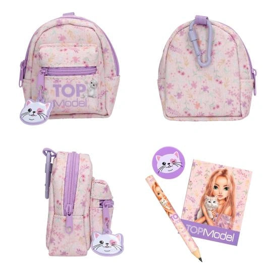 Pink TOPModel stationery backpack with cat detail shown from front, back and side beside matching stationery