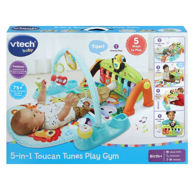 VTech 5-in-1 Toucan Tunes Play Gym packaging with baby shown using activity mat – Ireland