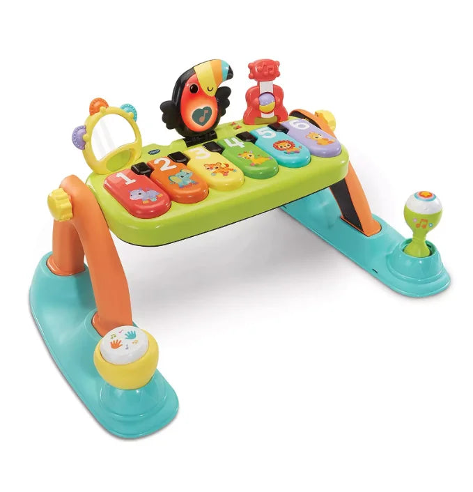 Close-up of VTech Toucan Tunes Play Gym piano with six keys and light-up toucan – Ireland