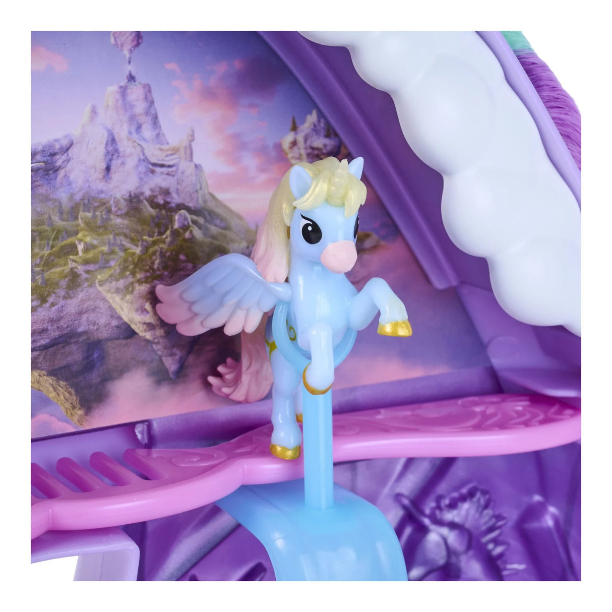 Small blue winged unicorn figure displayed on a blue stand inside the Wildstar playset