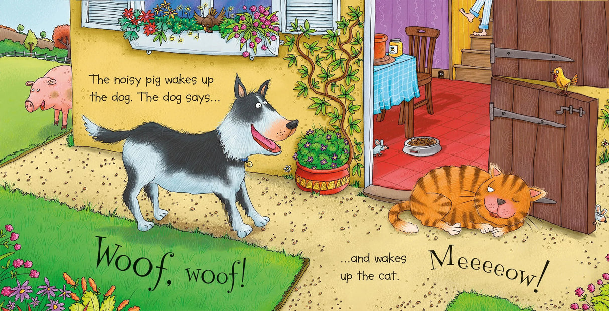 Usborne Noisy Farm book spread showing a dog outside a barn and a cat indoors