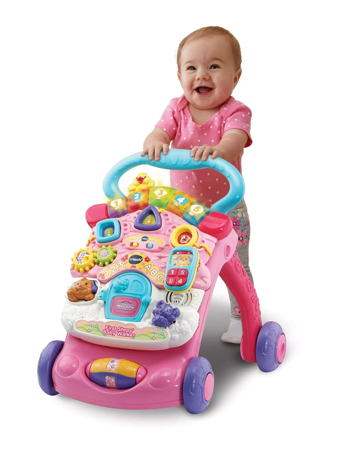 Baby smiling while learning to walk using the VTech First Steps Baby Walker pink version