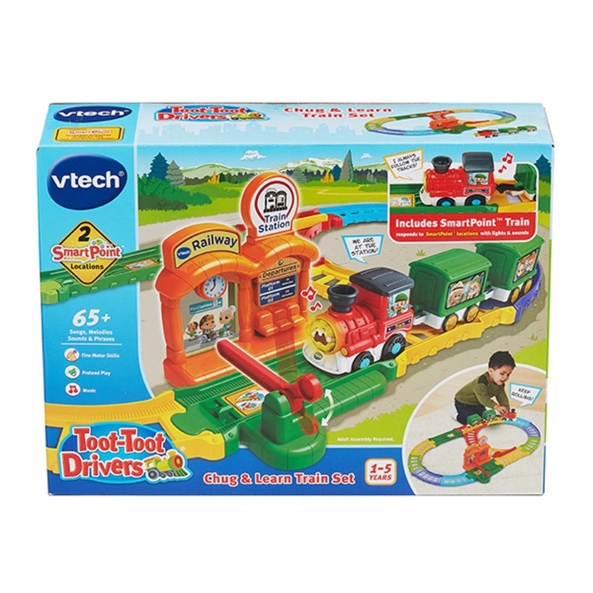 VTech Toot-Toot Drivers Chug & Learn Train Set retail box featuring the assembled train and station artwork, SmartPoint badges, 65+ songs & phrases callouts, and product imagery.