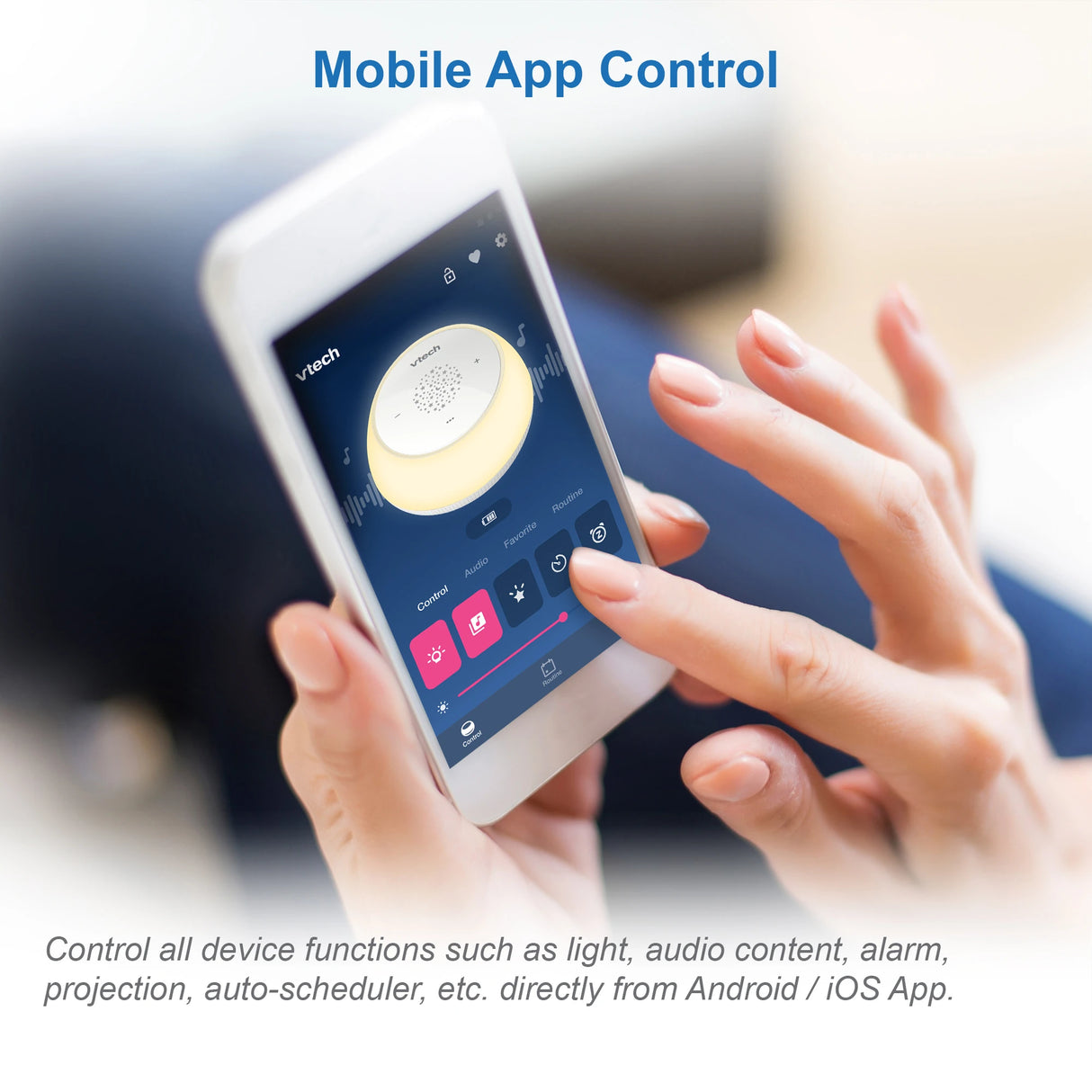 Hand using the mobile app controls for the VTech V-Hush Mini Sleep Soother