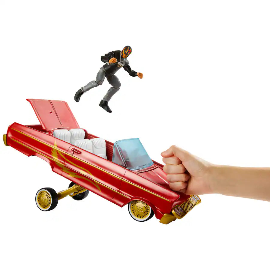 WWE Lucha Low Rider Vehicle showing Rey Mysterio figure launching from the rear of the raised car