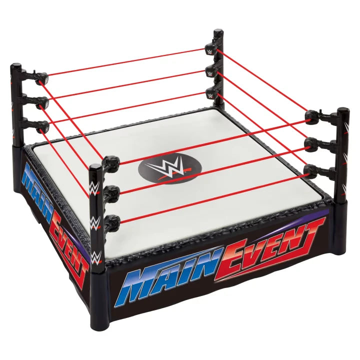 WWE Superstar Ring assembled with Main Event apron labels, red Pro Tension ropes and WWE logo on the ring mat