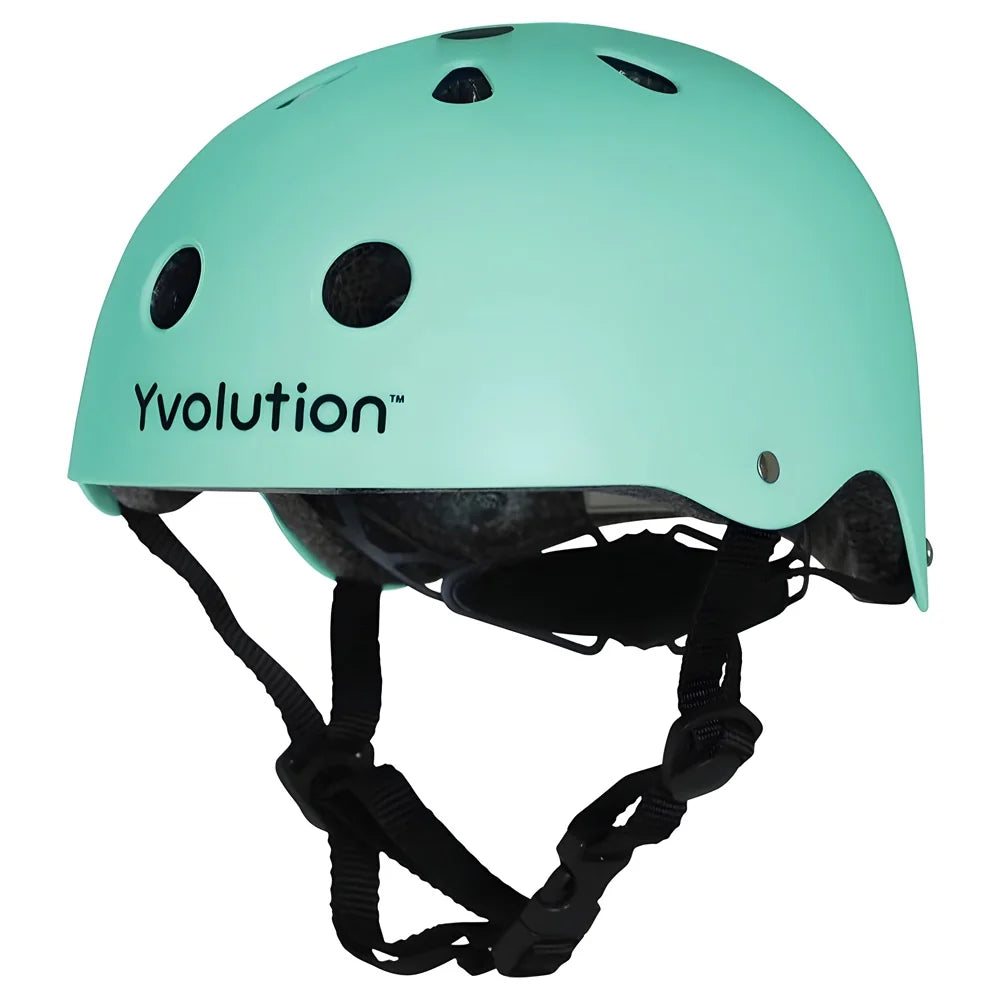 Green Yvolution kids helmet front angled view showing vents, smooth shell, and strap system on a white background
