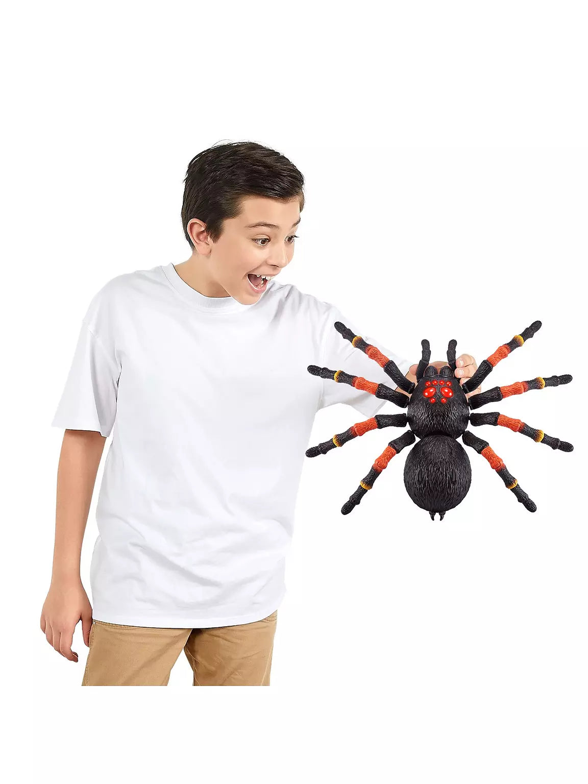 Child holding the Zuru Robo Alive Giant Tarantula toy