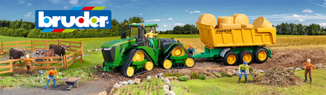 Bruder logo banner with tracked John Deere tractor towing a Joskin trailer of hay bales, cows and bworld figures in Ireland