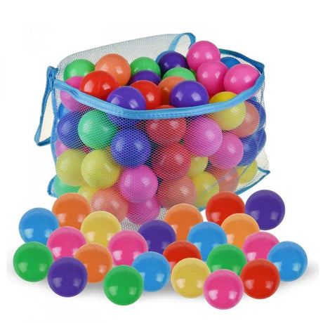 Assorted colourful playballs displayed with storage bag for ball pits in Ireland