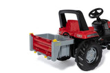 Rolly transport box attached to the rear hitch of a red pedal tractor for realistic farm play