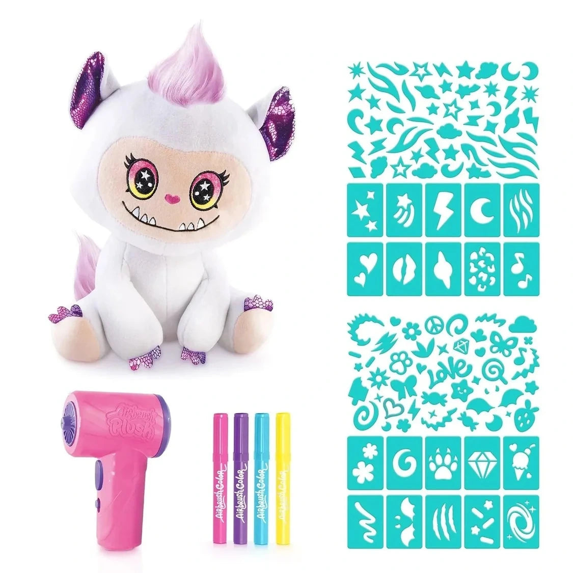 White Airbrush Plush Cutie Monster with pink hair and purple ears, displayed beside a pink airbrush tool, four pink, purple, blue and yellow markers, and turquoise stencil sheets featuring stars, hearts, lightning bolts and other patterns.