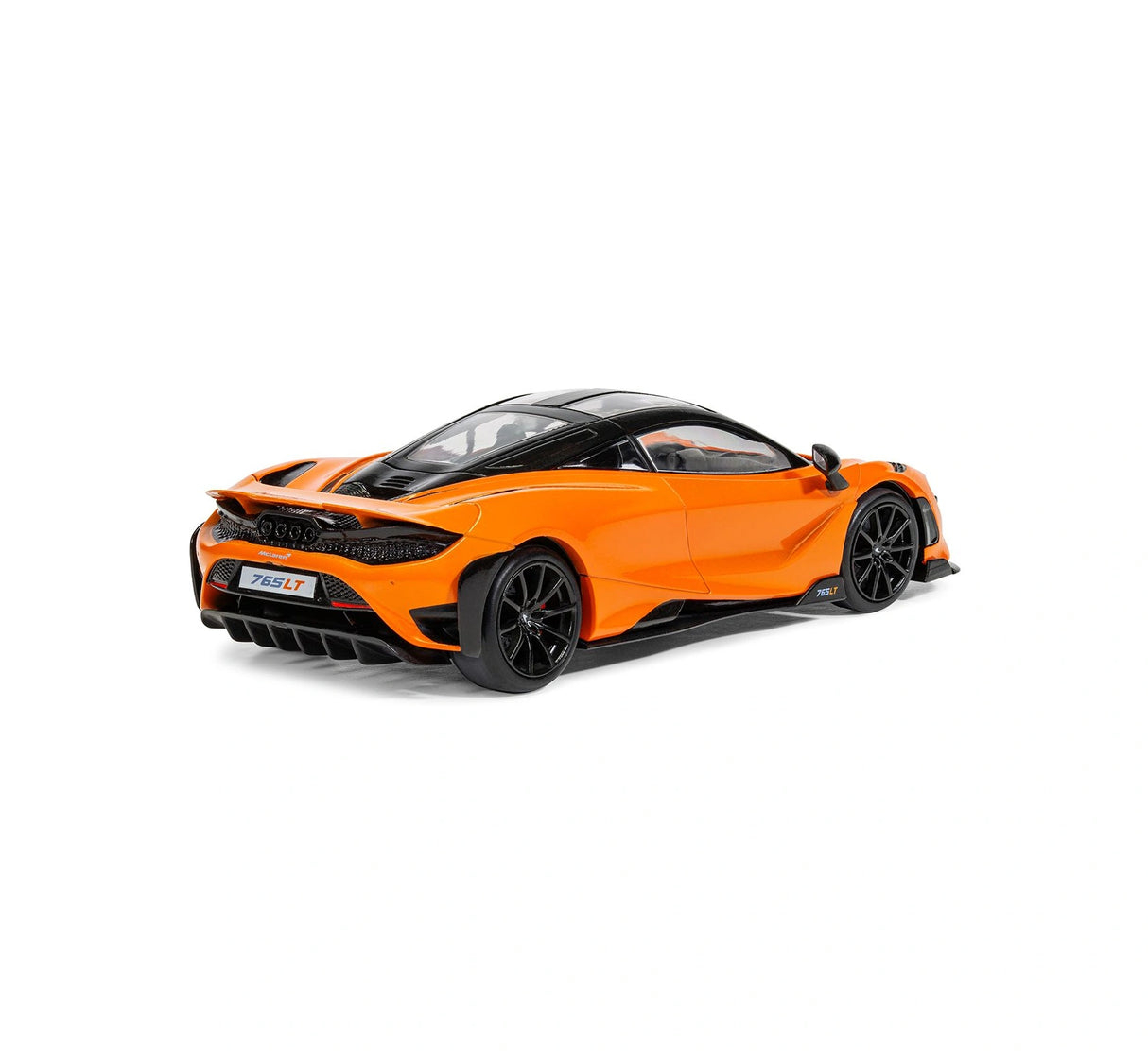 Assembled Airfix McLaren 765LT model shown from a rear three quarter angle with rear diffuser, exhaust outlets and rear body contours visible on a white background