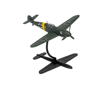 Messerschmitt Bf109F-4 model aircraft painted dark green with black and white cross markings and a yellow fuselage band, mounted on a black display stand against a white background