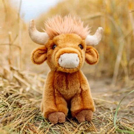 Animigos World of Nature Highland Cow plush front view with cream horns and brown hooves