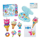 Aquabeads Ice Cream Party Craft Studio retail box displayed with the open turquoise storage case, ice cream bead pen, bead templates and a selection of completed ice cream cones, lollies and sweets.