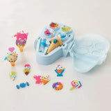 Open turquoise Aquabeads Ice Cream Party Craft Studio case containing coloured beads, ice cream bead pen and water sprayer, surrounded by finished ice cream cones, sweets and ice lolly designs.