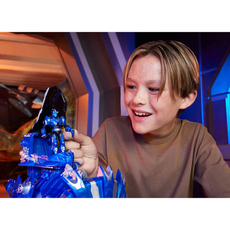 Child holding Armorsaurs Armor-Up Triceratops Dinosaur Cobalt toy figure