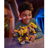 Child playing with the fully armoured Armorsaurs Yellow Raptor Dinosaur Blaze toy figure