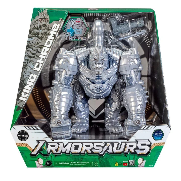 Armorsaurs King Chrome silver robotic villain figure inside its green and black retail packaging, showing the large armoured fists, Try Me feature and Armorsaurs logo.