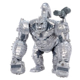 Armorsaurs King Chrome silver armoured villain figure with mechanical limbs, oversized fists, skull-like face and a large weapon extending above its right shoulder.