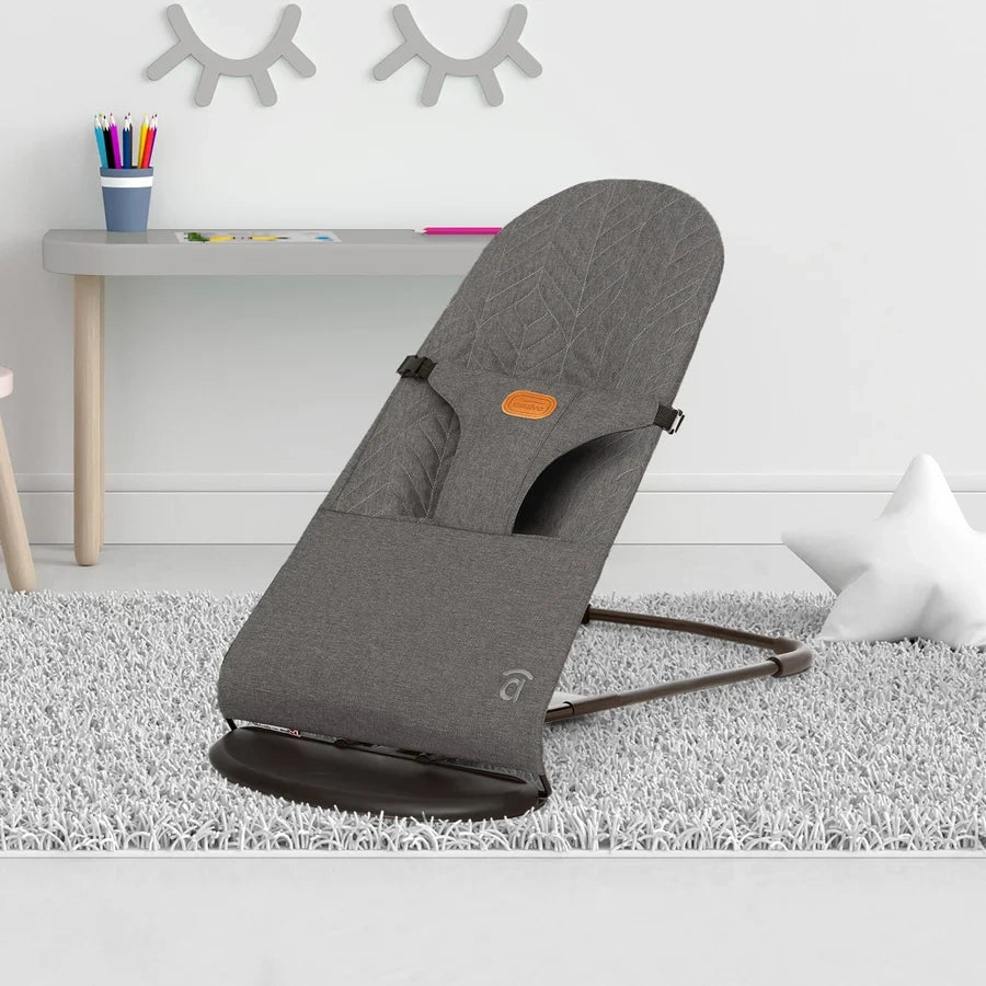 Grey Asalvo Paradise baby bouncer positioned on a rug in a child's room