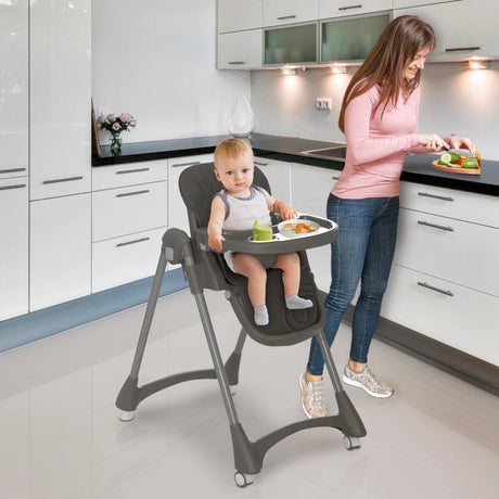 Asalvo Soja Mimosa Highchair shown in a kitchen with child seated and tray in use