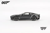 Grey Aston Martin DBS from No Time To Die in full right side profile showing the long bonnet, black roof panel, side vent and multi spoke wheels
