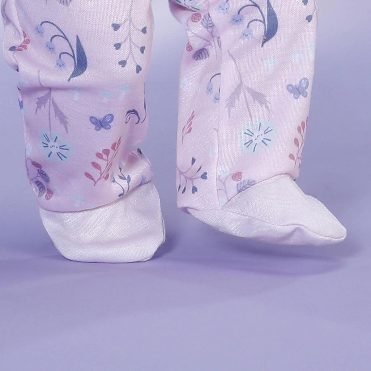Baby Born Romper Forest 43cm close up showing covered feet and printed fabric