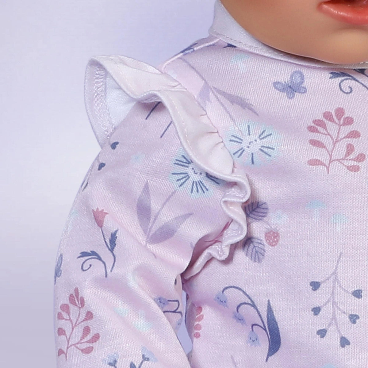 Baby Born Romper Forest 43cm close up showing ruffled sleeve and floral print