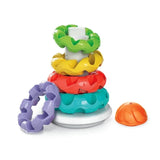 Baby Clementoni Stacking Rings with green, yellow, red and turquoise rings on the central post, purple ring leaning against the base and orange dome placed beside the tower.
