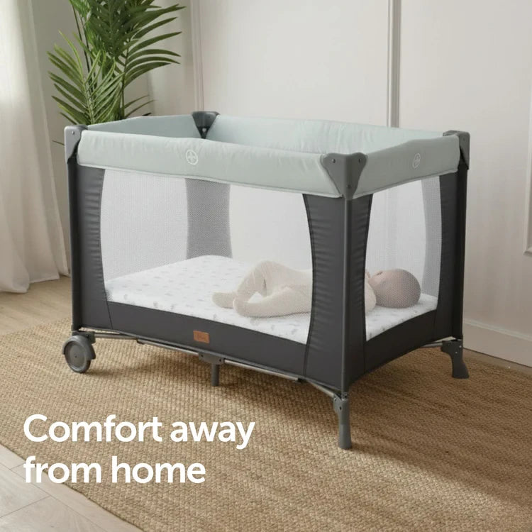 Baby Elegance Safari jersey fitted sheet on travel cot in nursery room