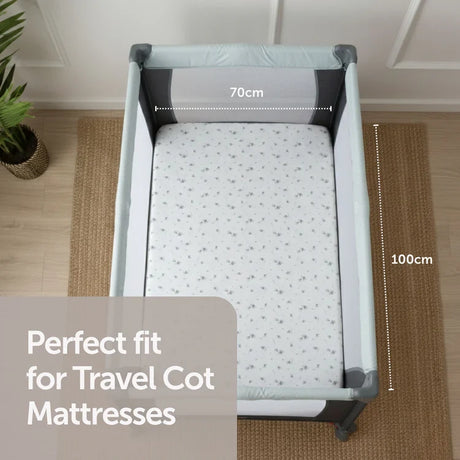 Baby Elegance Safari fitted sheet on travel cot mattress showing 70 cm by 100 cm size guide