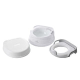 White and grey Babylo potty shown in separate components including the wide base, removable inner bowl, toilet seat insert and lid arranged on a white background