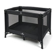 Babylo Alpha black travel cot front angle view with mesh sides and padded mattress