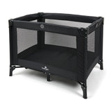 Babylo Alpha black travel cot front angle view with mesh sides and padded mattress