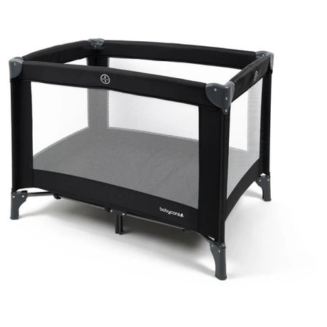 Babylo Alpha black travel cot side angle view with mesh panels and corner supports