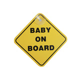 Babylo baby on board sign shown front facing on a white background with yellow diamond shape, black border, black baby on board text and suction cup at the top