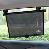 Babylo roller sunshade attached to a car side window inside a vehicle