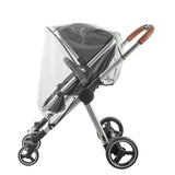 Babylo universal stroller rain cover shown from side view on a grey stroller, transparent plastic cover stretched over seat and canopy with stroller frame and wheels visible