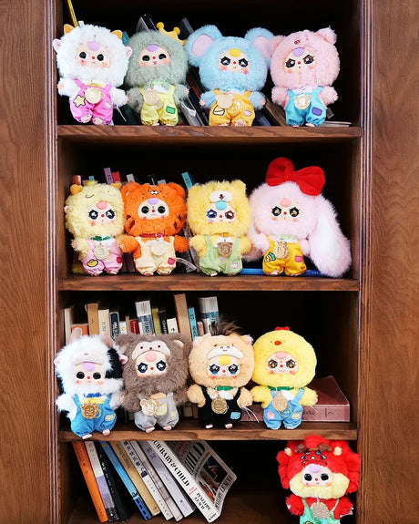 Shelf display of Baby Three Twelve Zodiac V2 plush toys arranged in rows