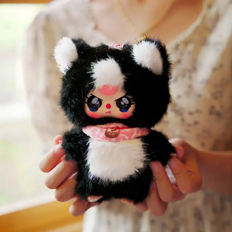Child holding BabyThree Whose Cat Am I plush with embroidered details and keychain loop – Ireland.