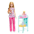 Barbie Baby Doctor doll wearing floral scrubs and pink trousers while holding a brown haired baby, beside a turquoise examination trolley with a blonde baby sitting in a pink bath and medical supplies stored underneath.