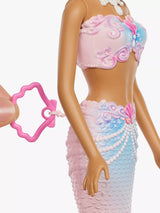 Barbie Bubble Sparkle Mermaid close view showing pink seashell pull tab beside her tail
