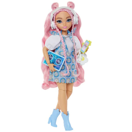 Barbie Dream Besties Daisy Jean doll with long pink hair, blue patterned outfit, and DJ tablet accessory