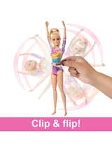 Barbie gymnast doll performing a flip using clip feature from the Barbie Gymnastics Playset