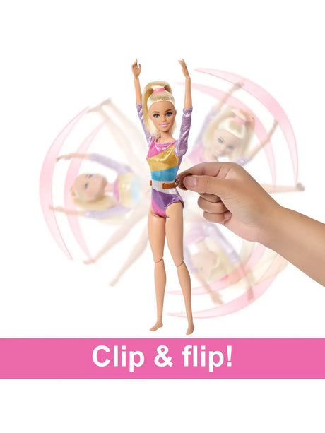Barbie gymnast doll performing a flip using clip feature from the Barbie Gymnastics Playset