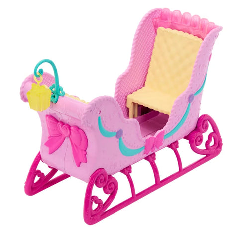 Pink Barbie Nutcracker sled with yellow seat, decorative bow and hanging lantern