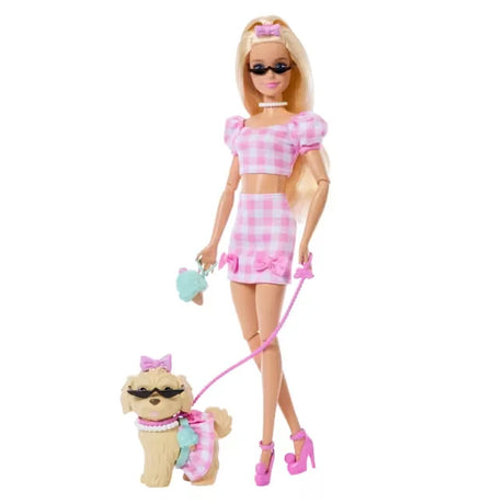 Barbie Twinning Looks Doll with pet dog wearing matching pink outfit and accessories.