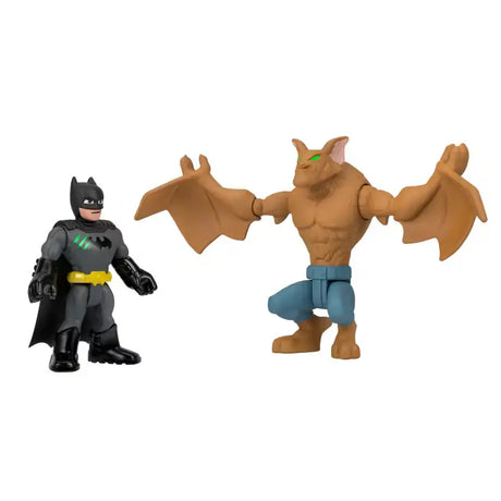 Batman figure standing beside the winged Man Bat figure